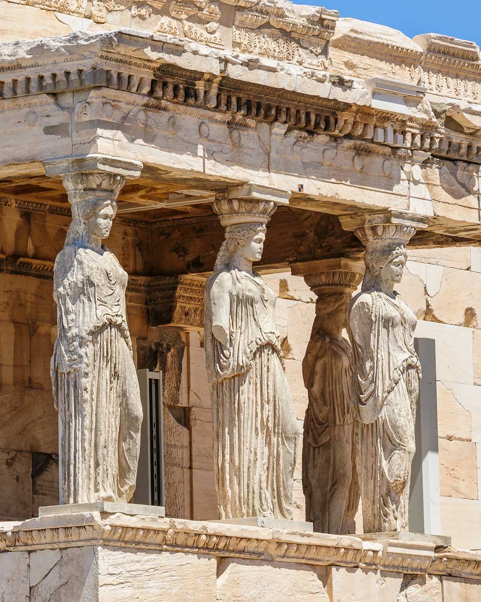An ancient statue in Acropolis on a tour from Athens Greece