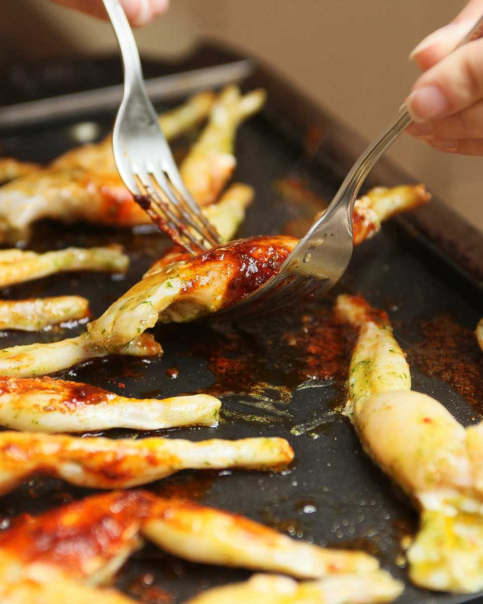 BBQ frog legs on a food tour in Phnom Penh Cambodia