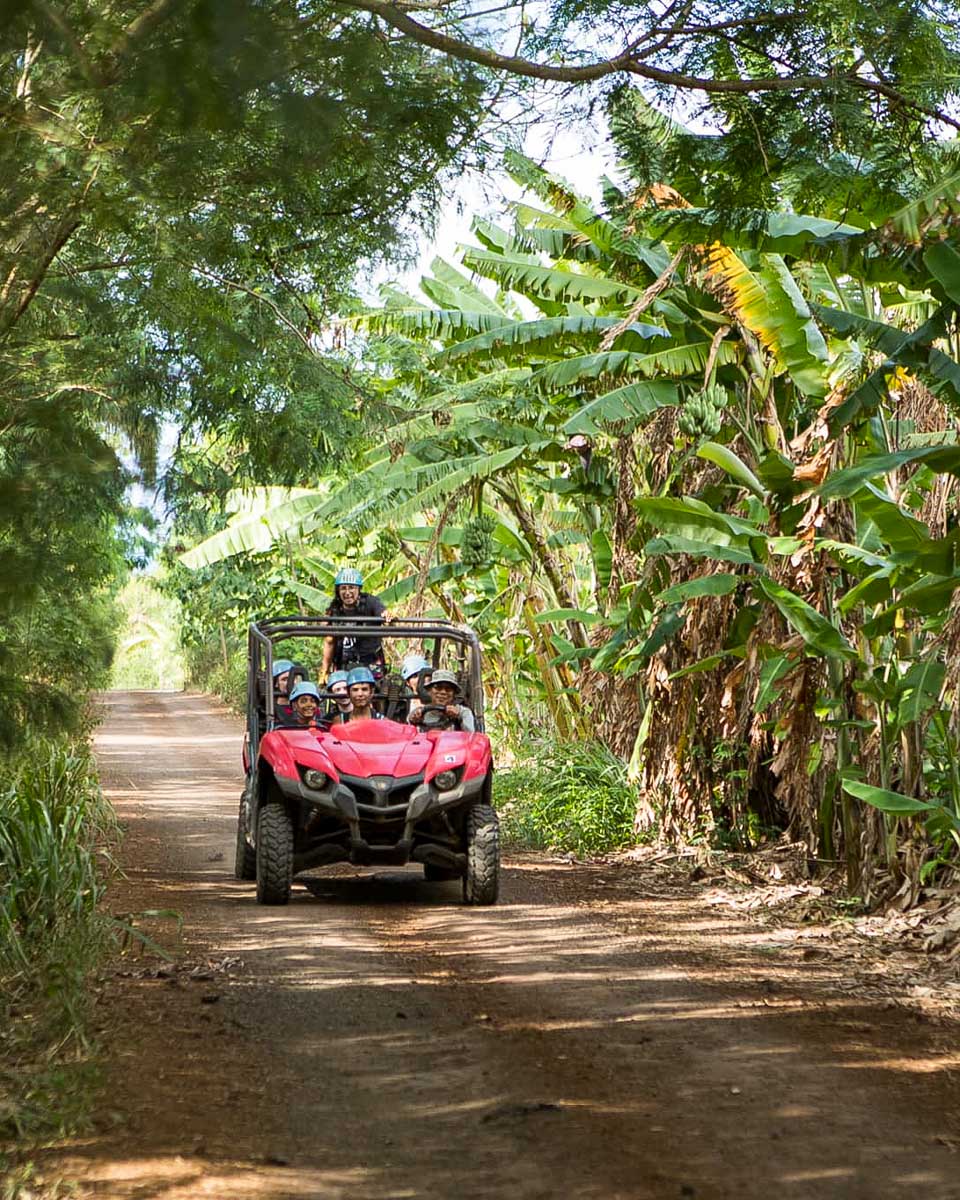 CLIMB Works Keana Farms people in an ATV to go ziplining in Oahu Hawaii