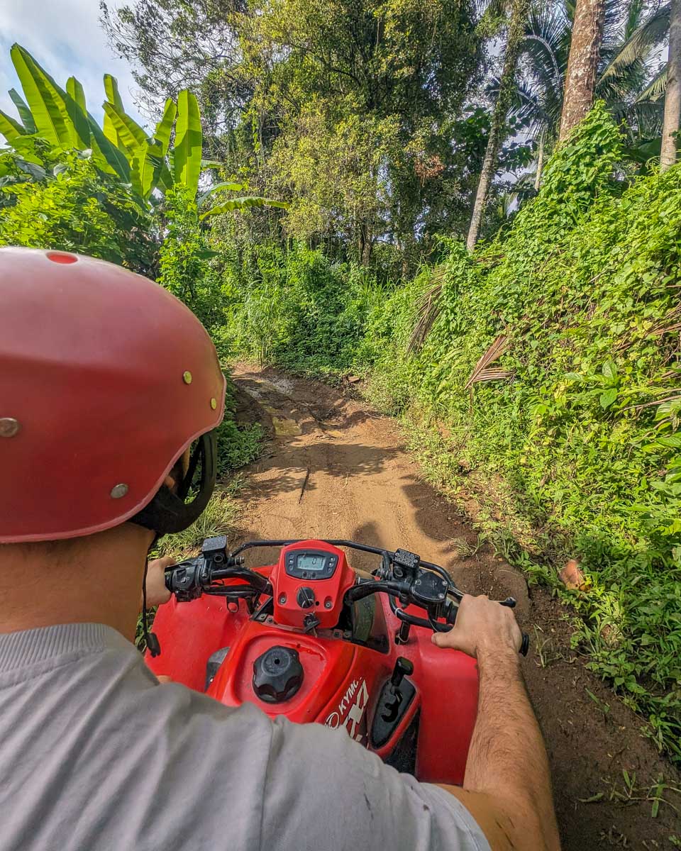 Daniel-and-Bailey-ride-ATV-through-jungle-in-Phuket Thailand