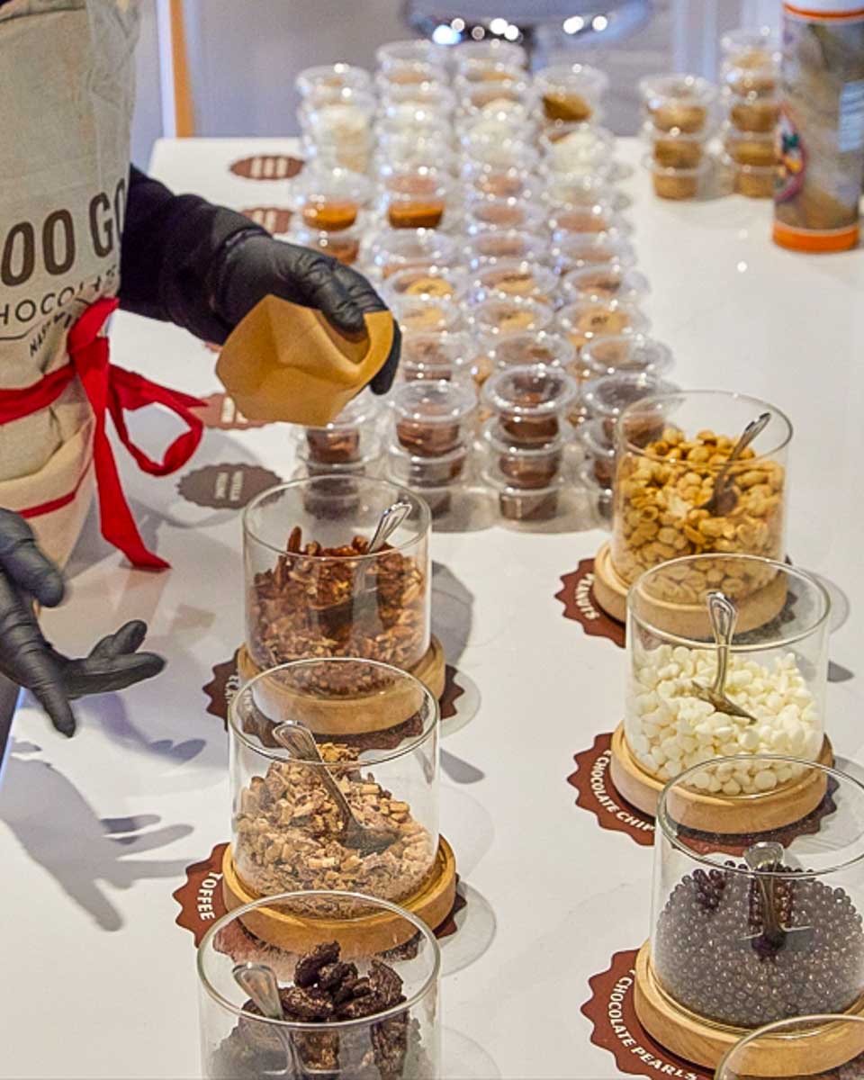 Goo Goo Clusters a person making a goo goo cluster in Nashville Tennessee