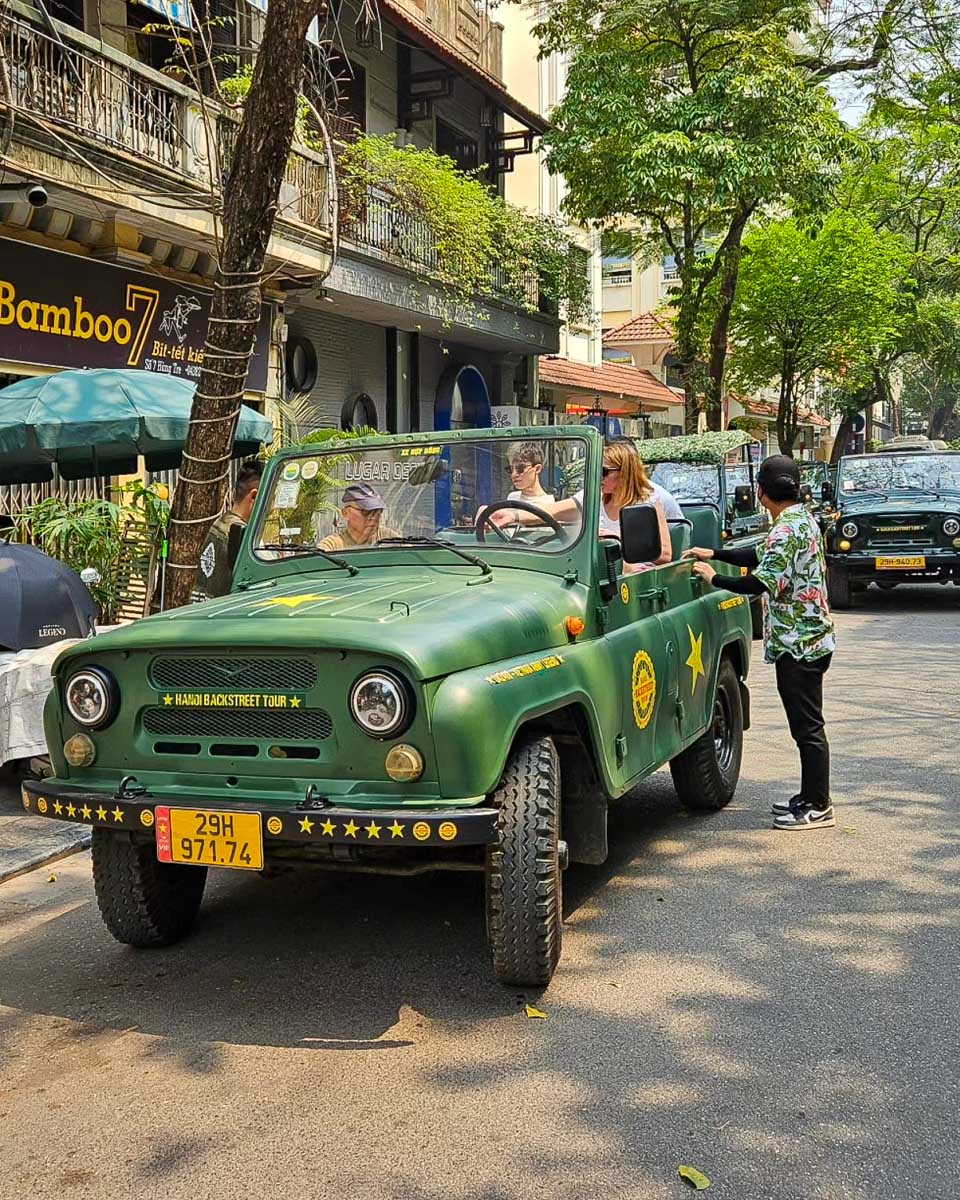 Hanoi Backstreet Tours a jeep in the street of Hanoi Vietnam