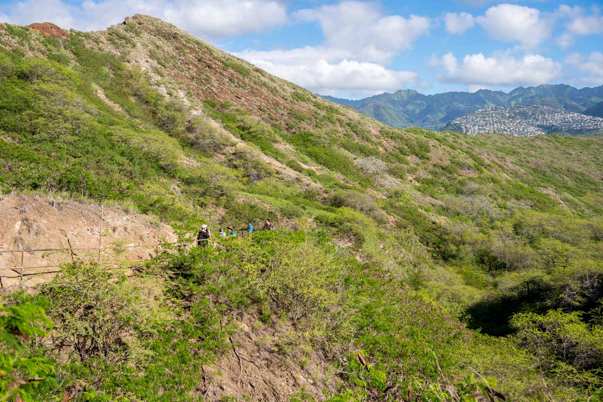 People hike on the Diamond Head Trail on Oahu Hawaii
