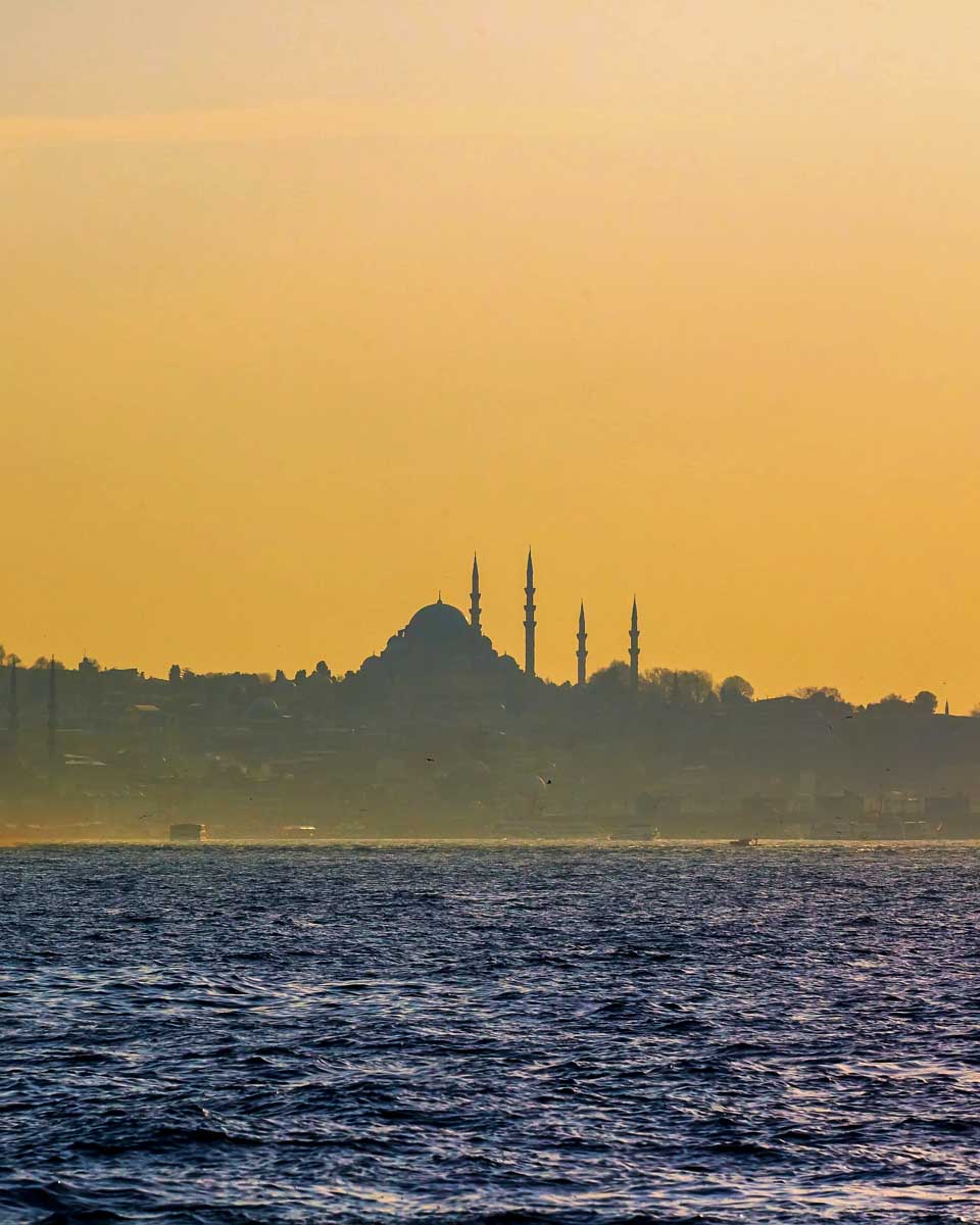 Sunset on the Bosphorus Strait during a cruise in Istanbul Turkey
