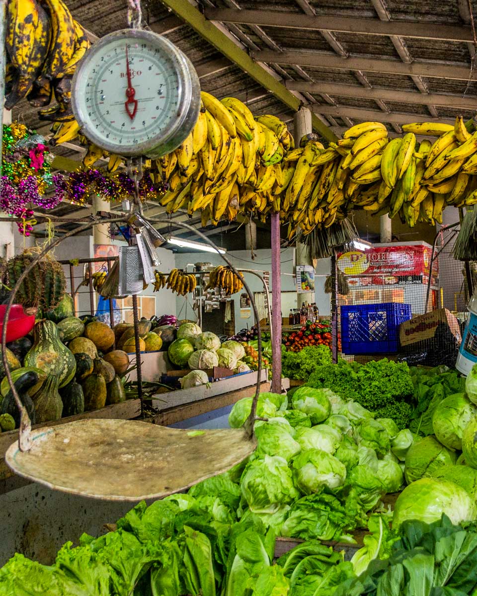 A fruit vendor at a market on a tour from Punta Cana Dominican Republic