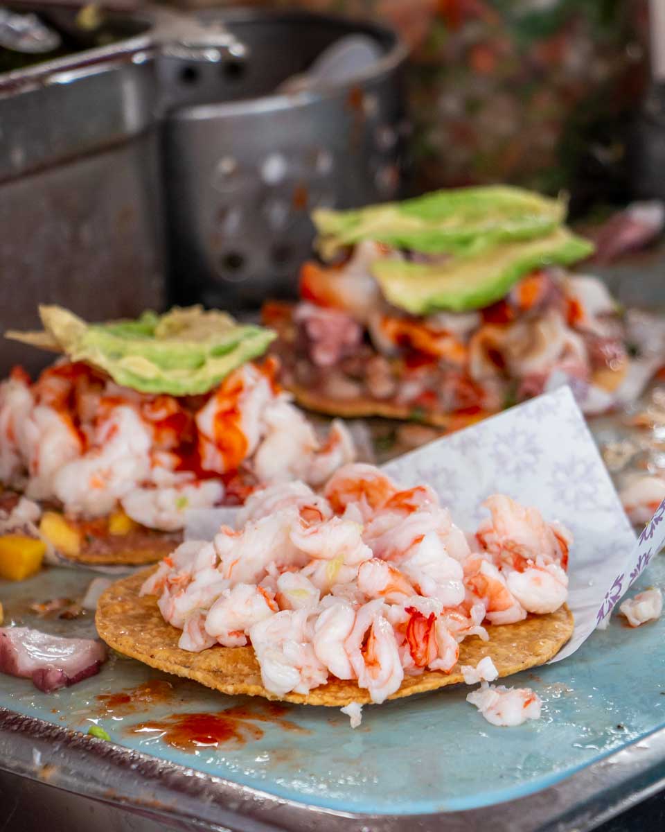 A tostada eaten on a food tour in Mexico City Mexico