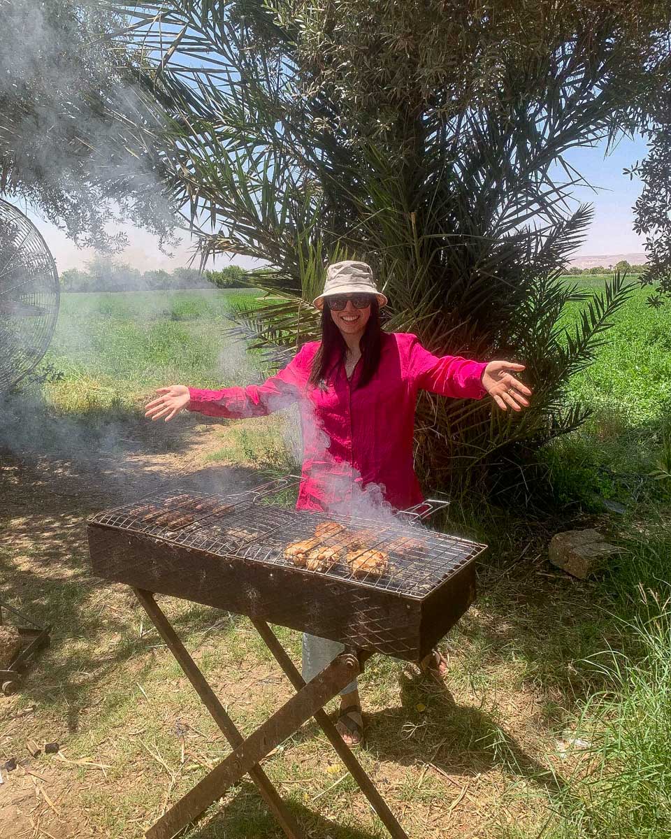 AlHabib Farm In Luxor a woman makes food on a tour from Luxor Egypt