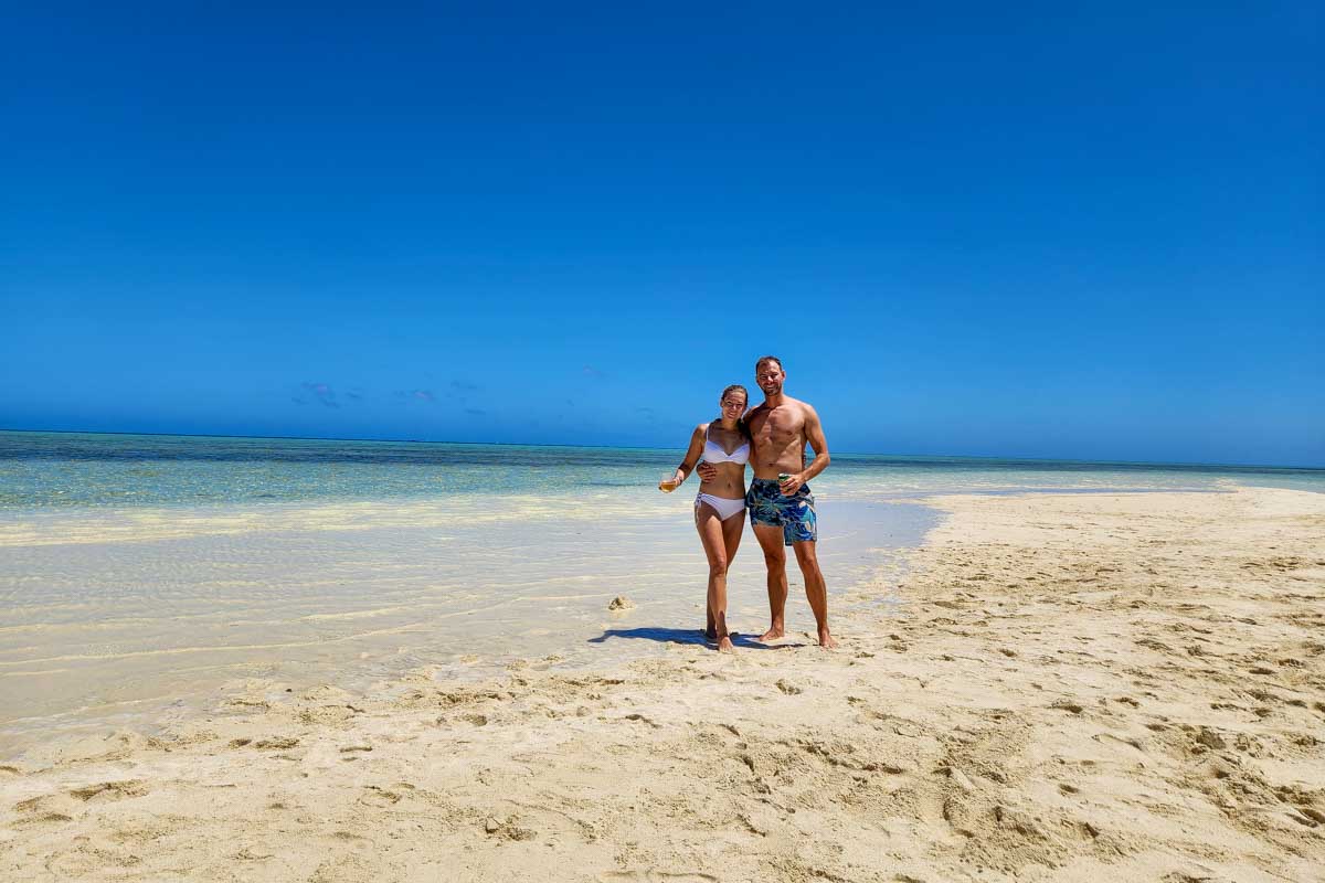 Bailey-and-Daniel-posing-for-a-picture-on-a-the beach in Punta Cana Dominican Republic