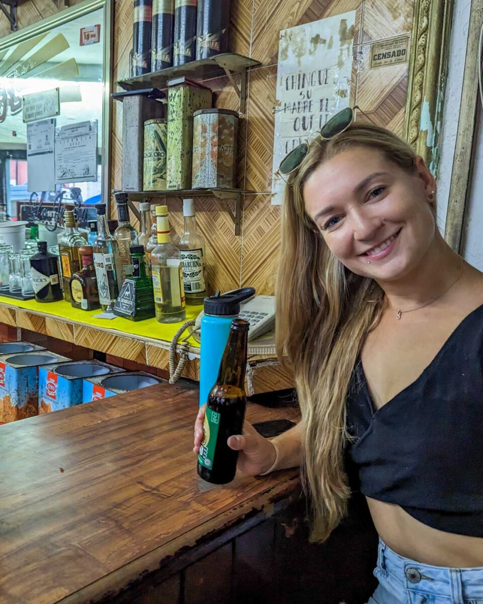 Bailey-enjoys-a-drink-in a cantina in Mexico City Mexico