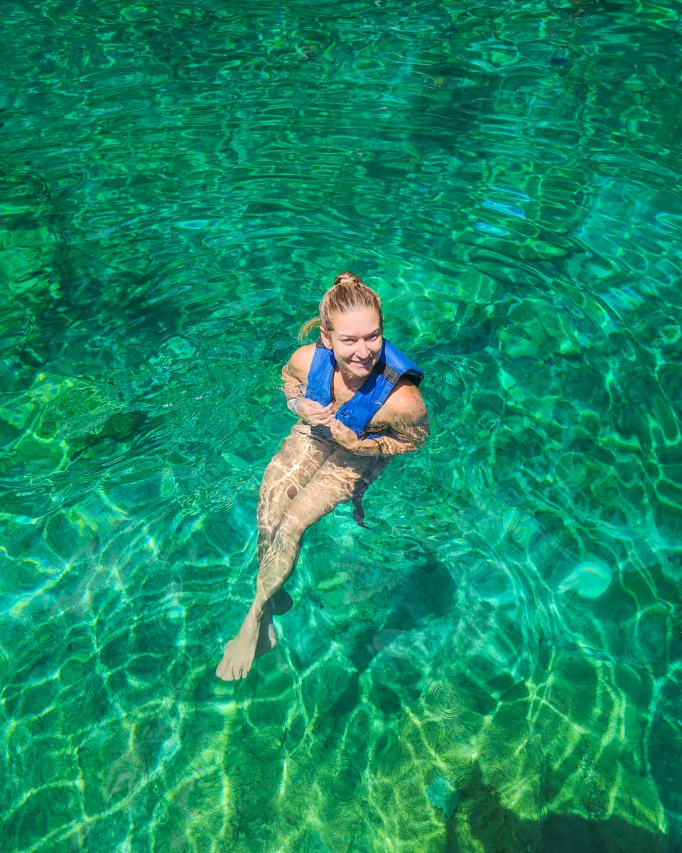 Bailey-swims-in-a-cenote-in-mexico on a tour from Merida