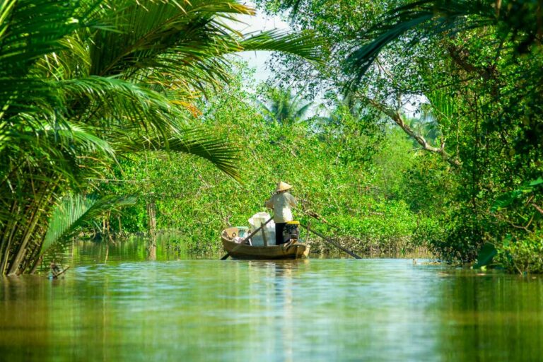 Boats in a harbor in the Mekong delta on a tour from Ho Chi MInh Vietnam