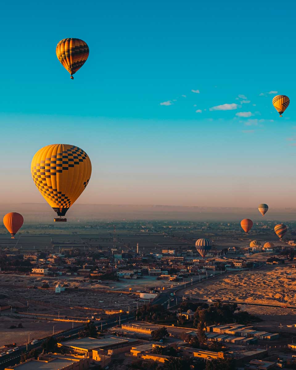 Hot-air-balloons-during-sunrise-on-a-cruise-from-Aswan to Luxor-Egypt