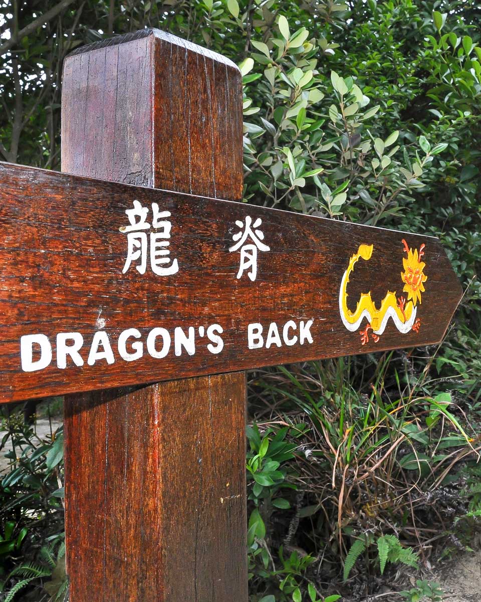 Sign for the Dragons Back hiking trail on a tour from Hong Kong