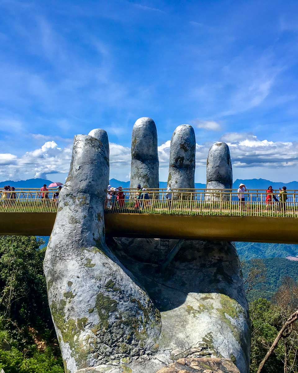 The Golden Bridge with people on it seen on a tour from Hoi An Vietnam