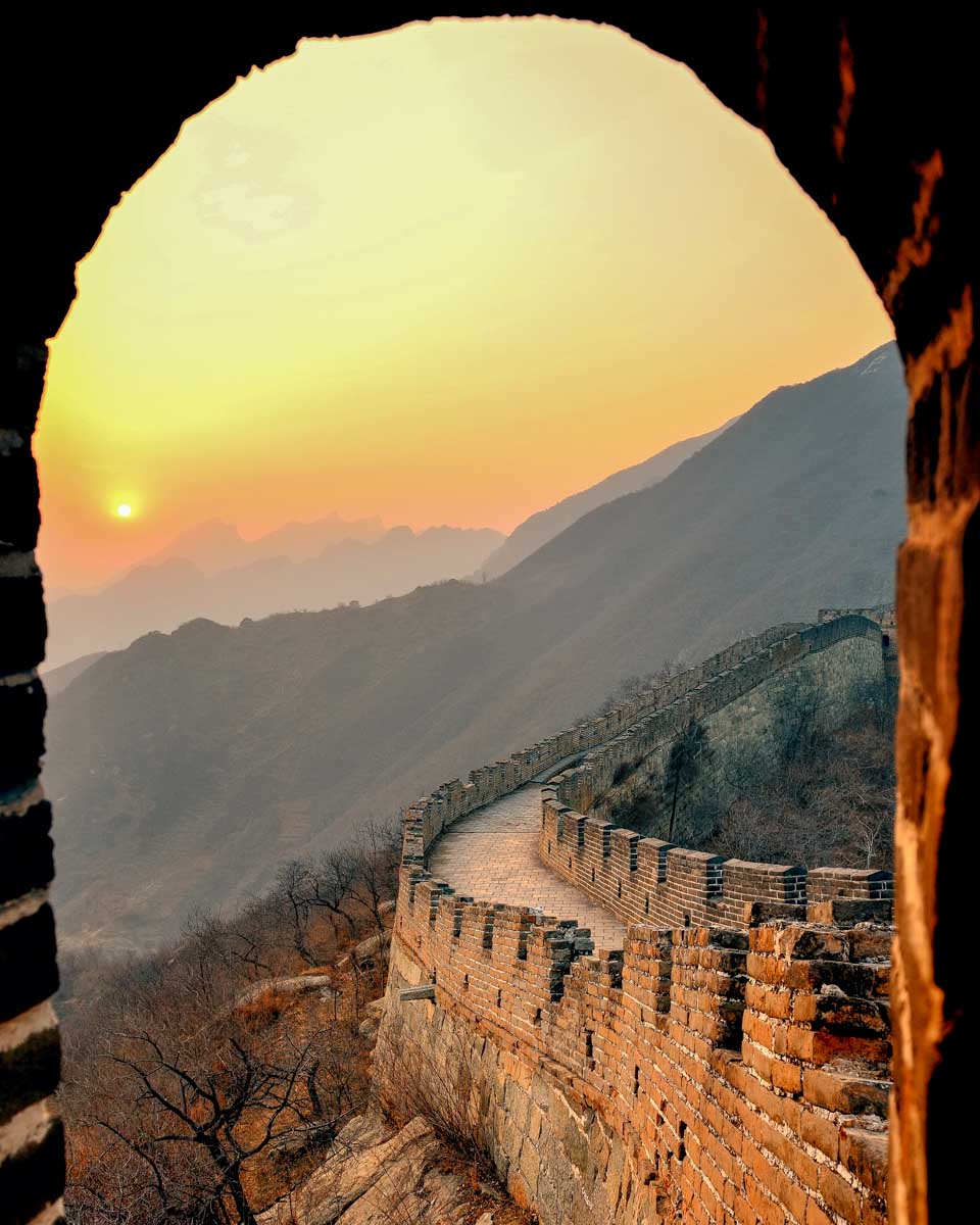 The great wall of jinshanling at sunset on a tour from Beijing China