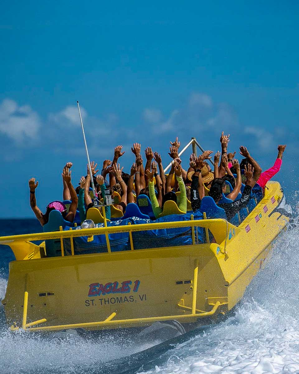 VI Jet Boat Tours a jet boat leaves on a tour in St Thomas Virgin Islands