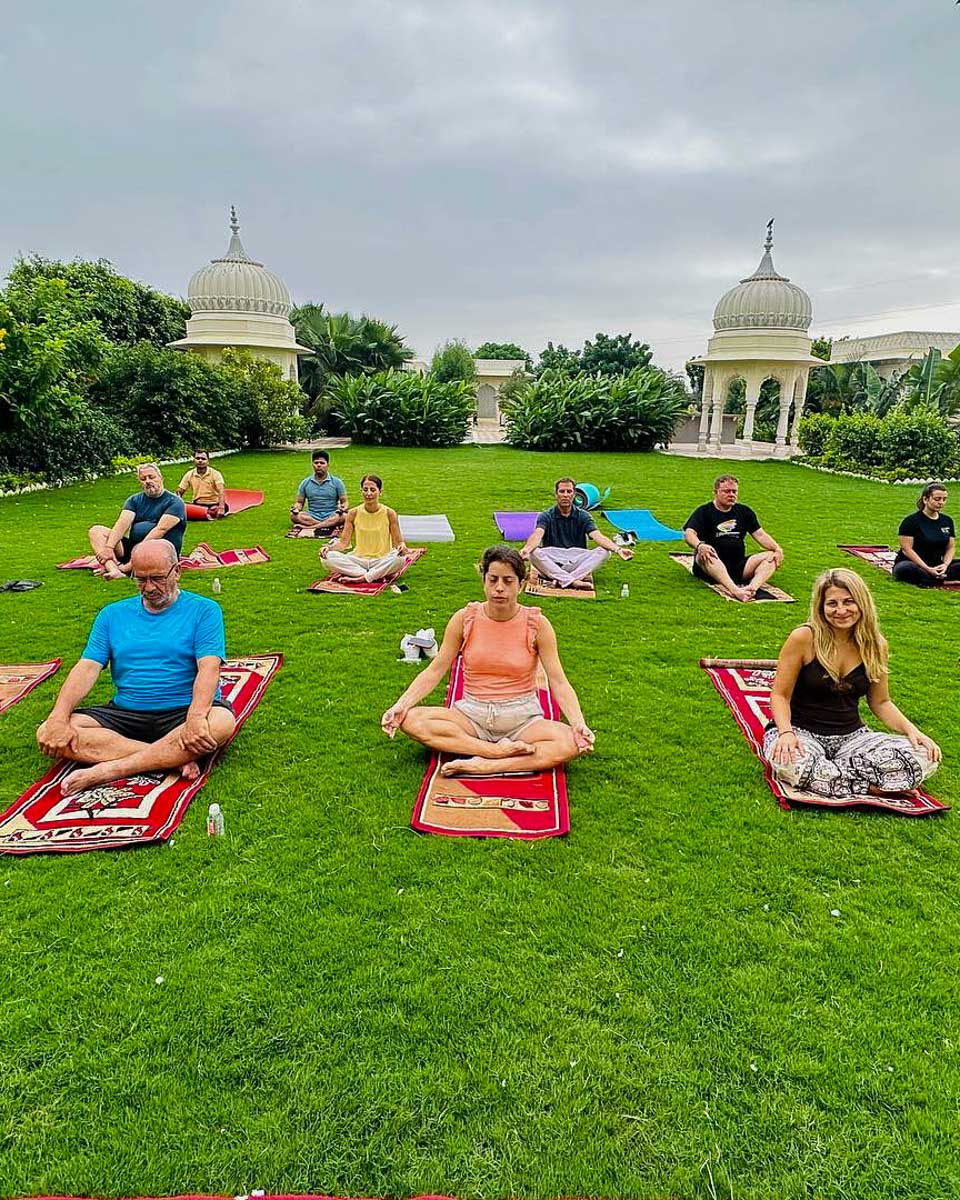 Yoga Tours by India people do yoga in the park in New Delhi