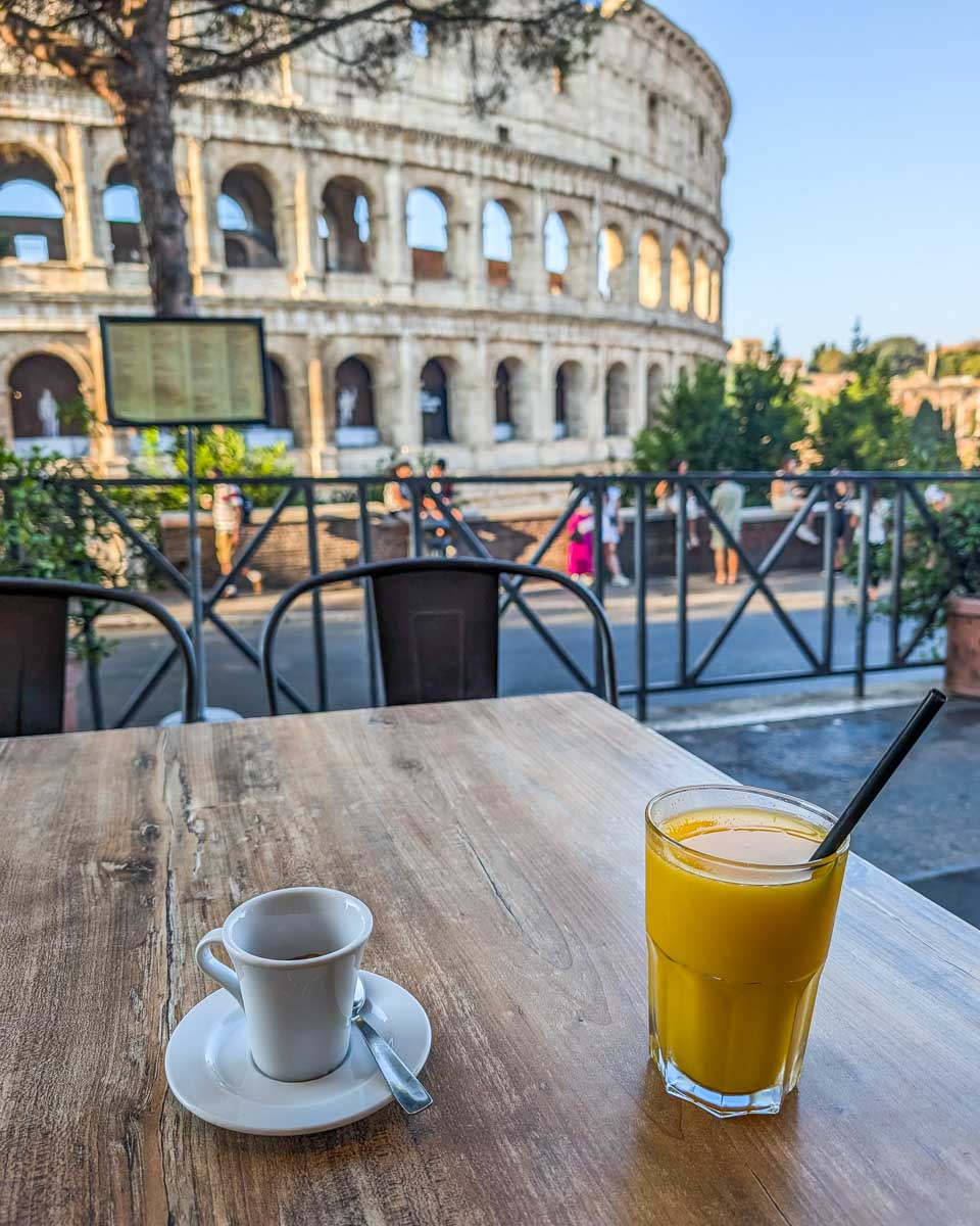 A coffee and a juice at La Biga Wine Food with a view of the Colosseum in Rome, Italy
