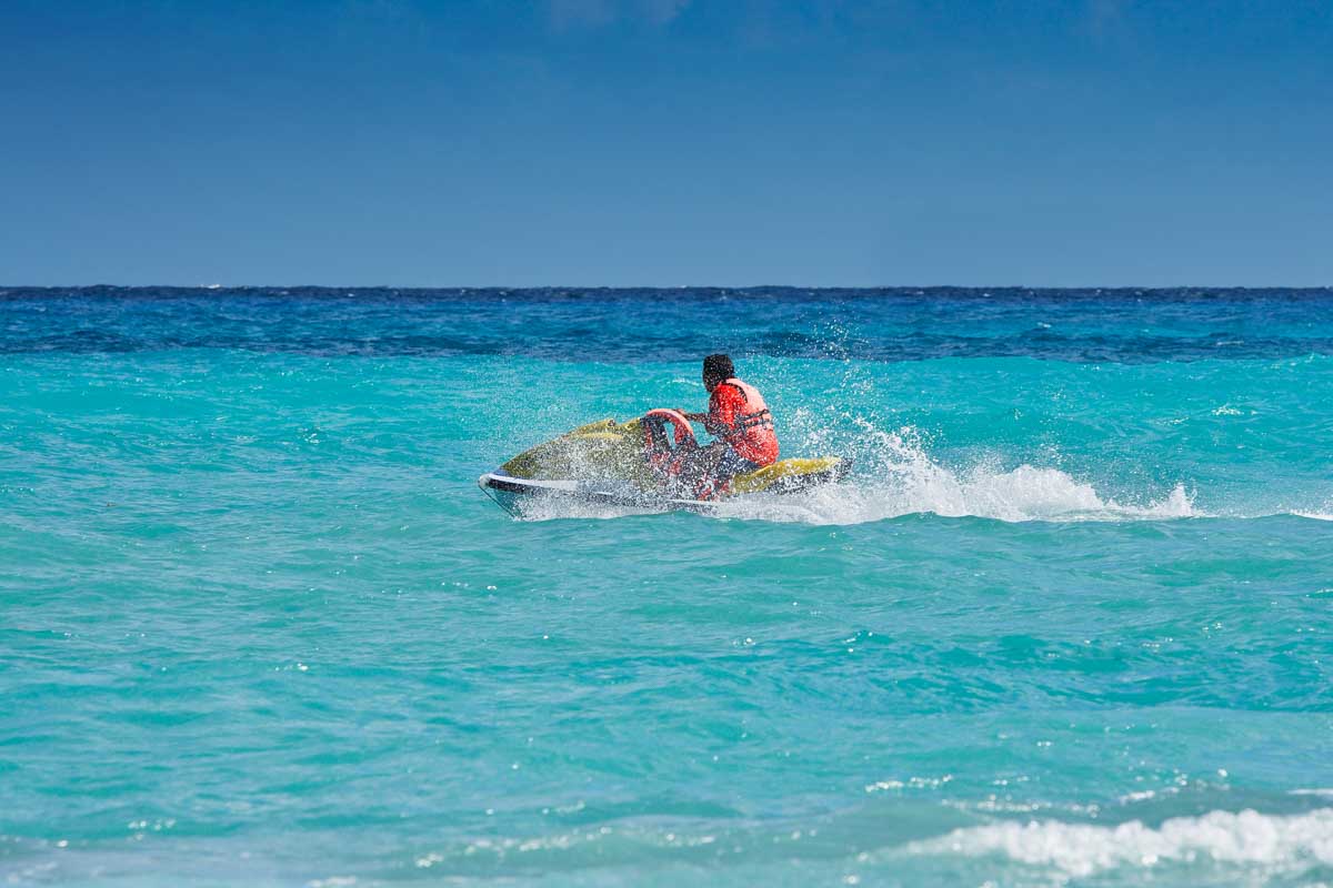 A-person-rides-a-jet-ski-in Philipsburg Saint Maarten