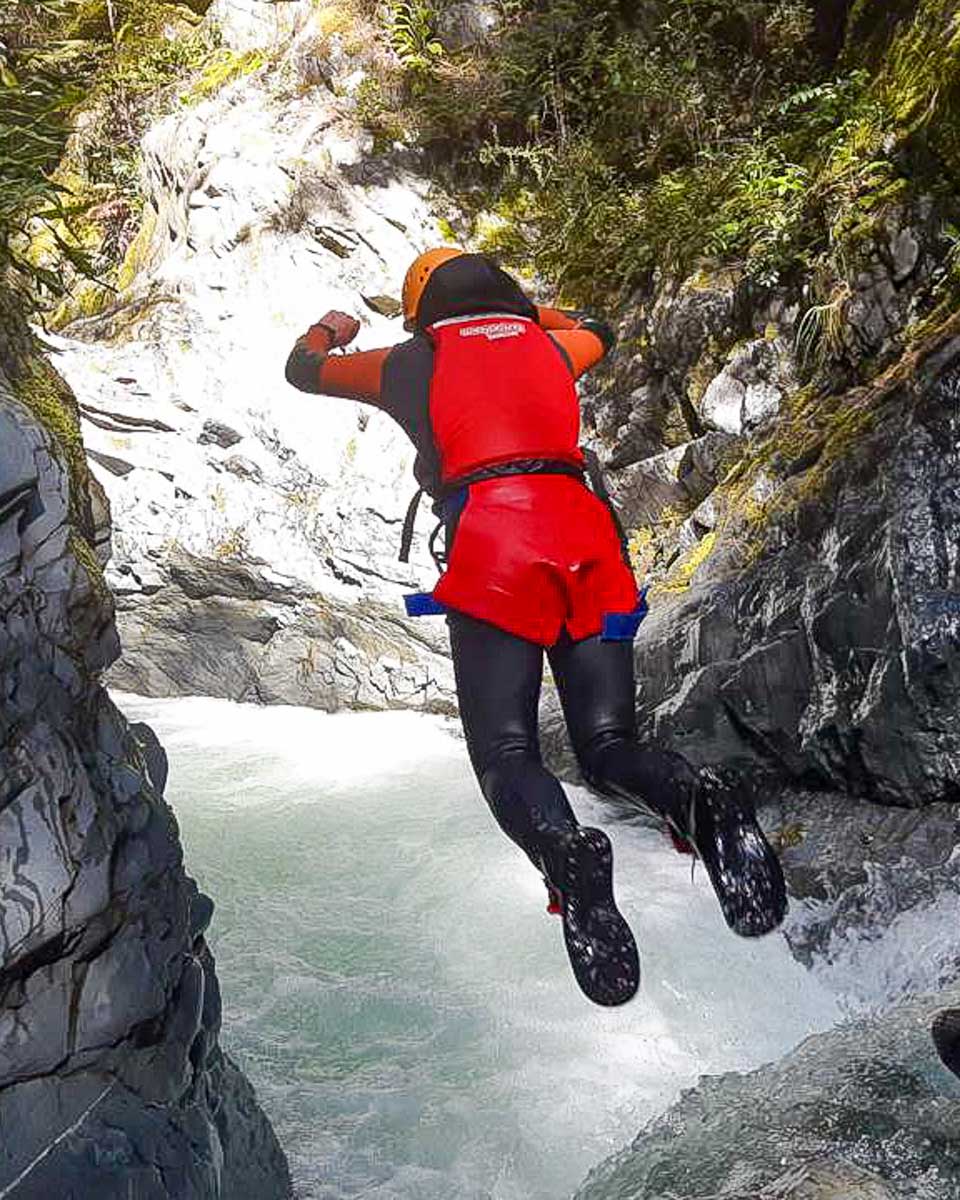 Bailey jumps off of a waterfall on a tour in Puerto Plata Dominican Republic