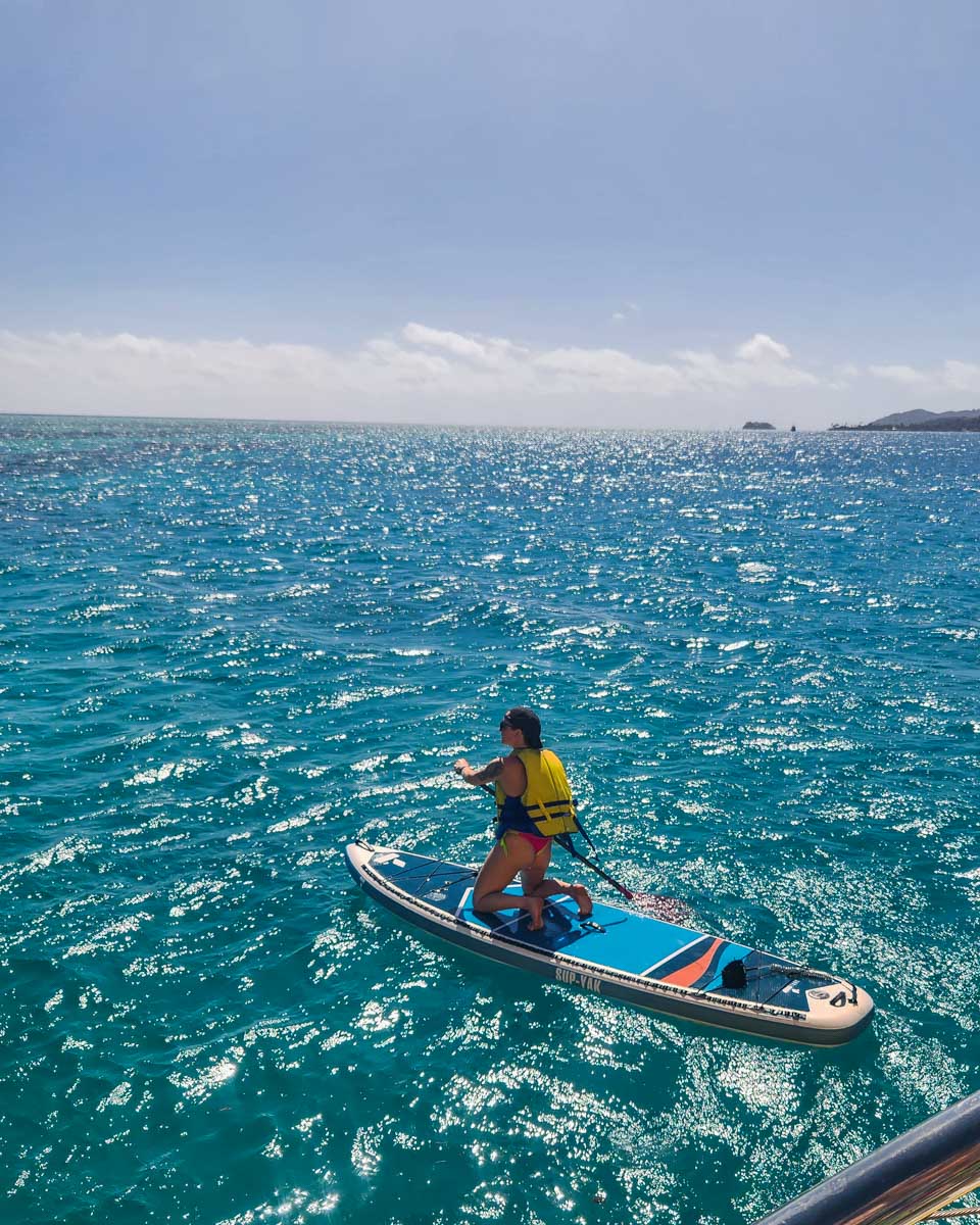 Bailey on a paddle board during a cruise in St Maarten