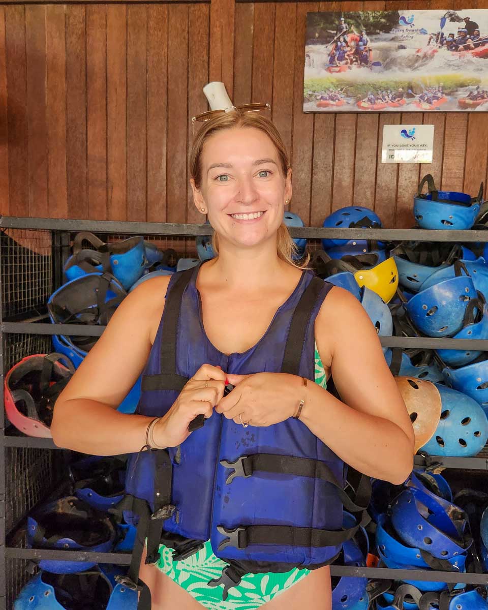 Bailey-putting-on-safety-gear-for-river-tubing-in-Montego Bay Jamaica