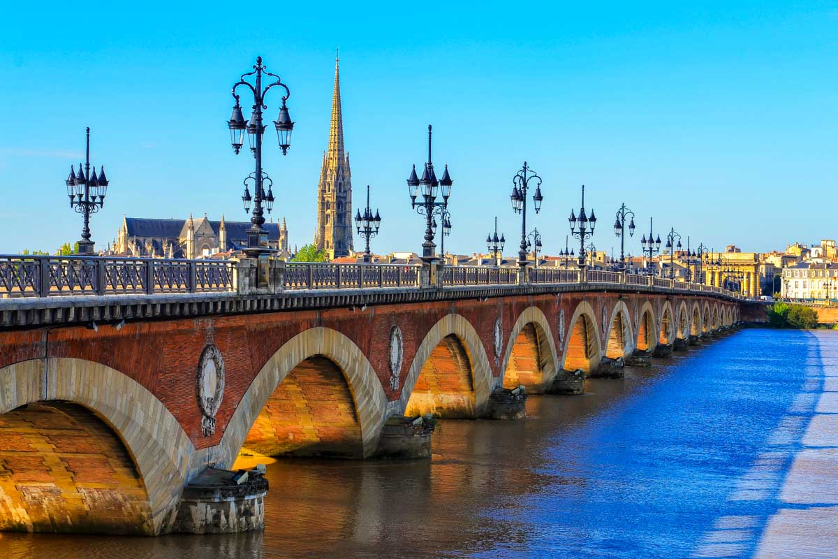 Bordeaux river bridge with St Michel cathedral in France