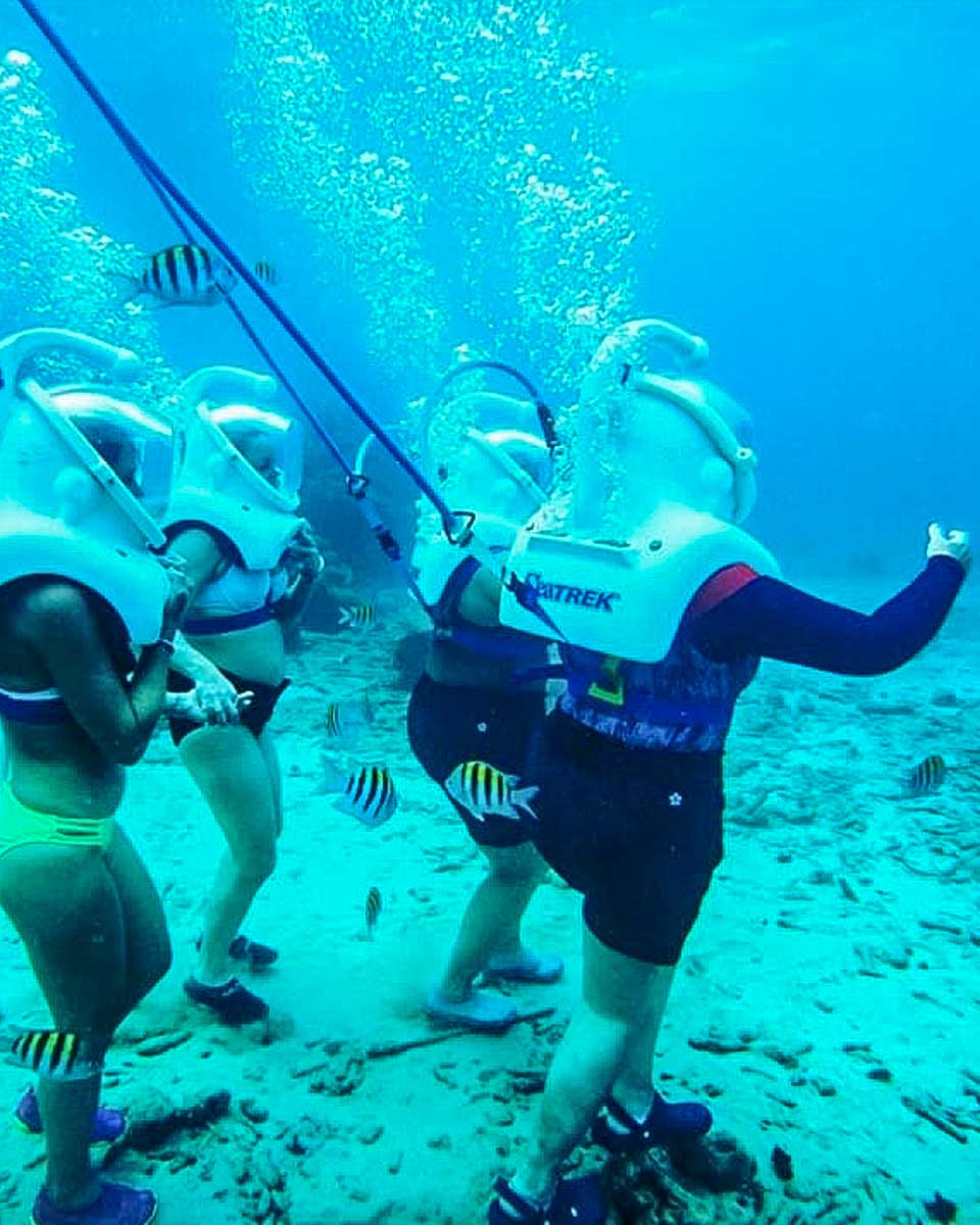 Sea TREK Curacao b.v. people walk underwater in Willemstad Curacao 2