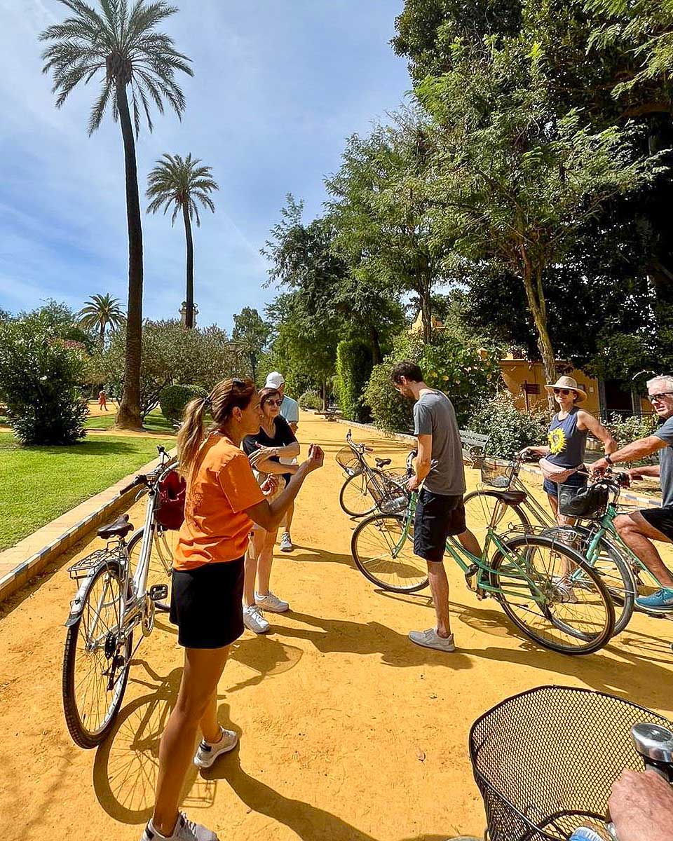 SeeByBike people listen to a guide on a bike tour in Seville Spain-2