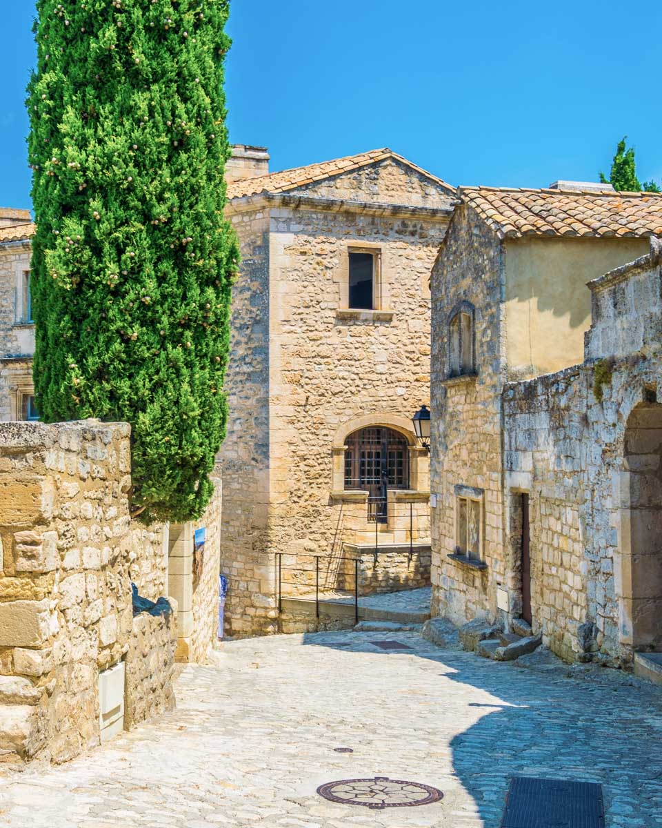 A historic street in Les Baux de Provence on a tour from Marseille France