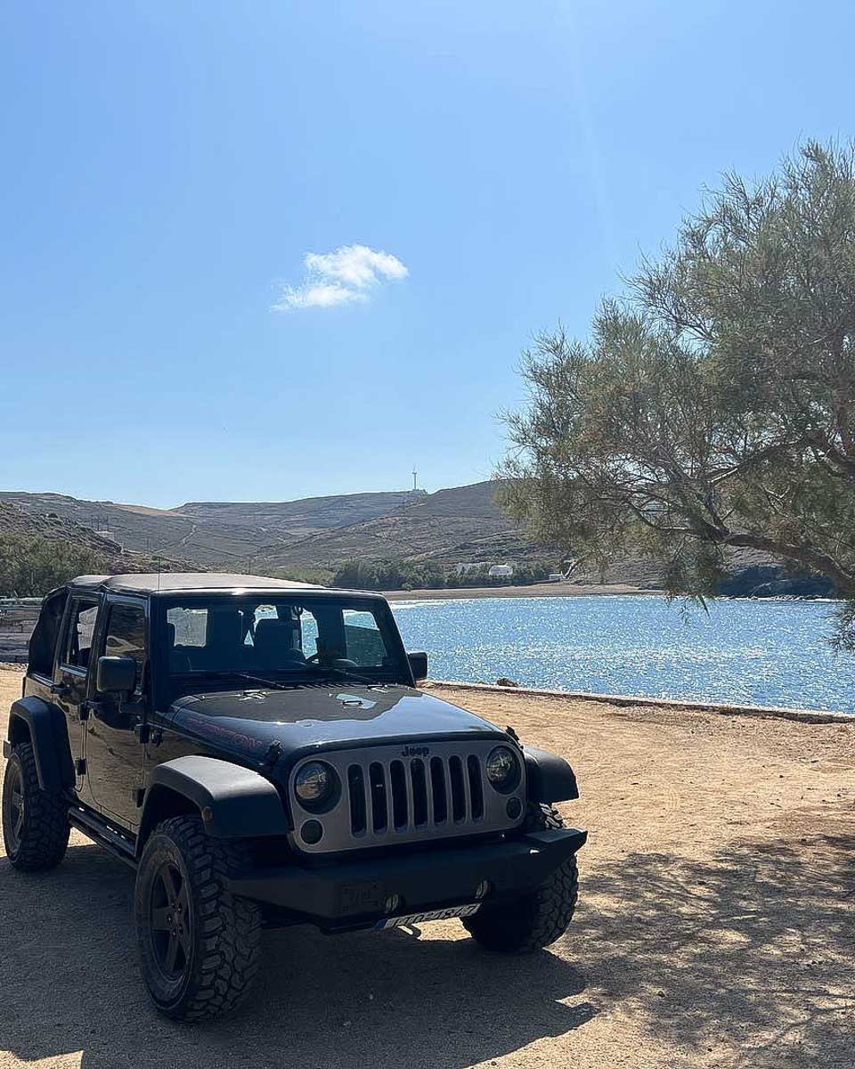 A jeep on the beach in Mykonos Greece