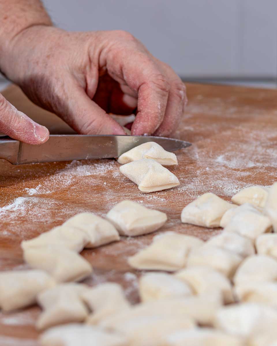 A-person-makes-gnocchi-during-a-cooking-class-in-Florence-Italy