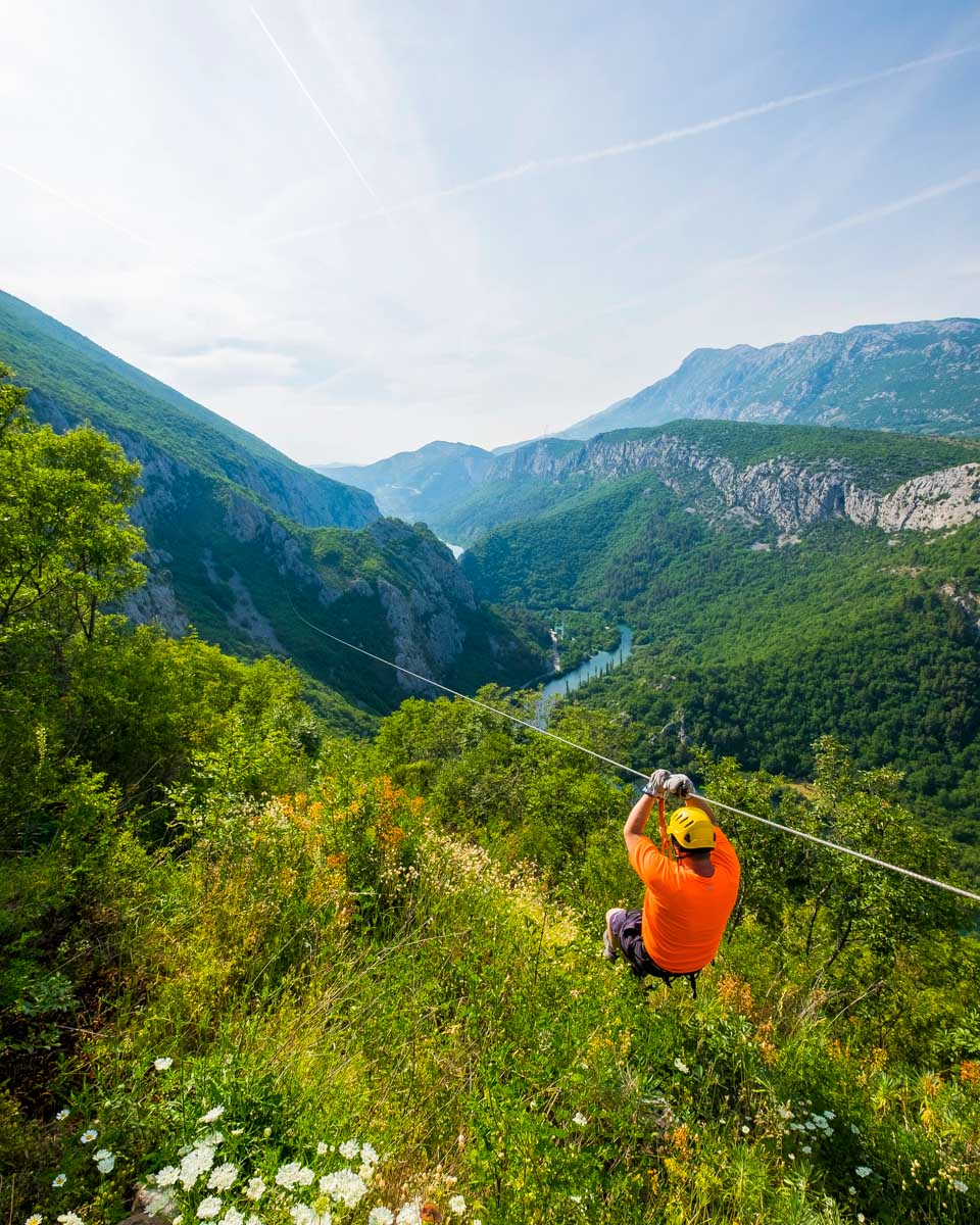 A person zipline in Cetina Canyon on a tour from Split Croatia