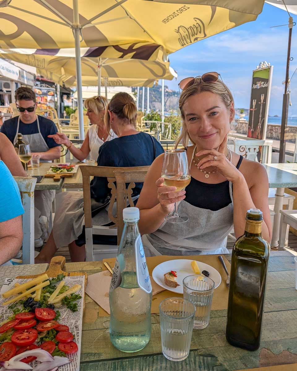 Bailey-drinks-wine-during-a-cooking-class-in-Sicily-Italy