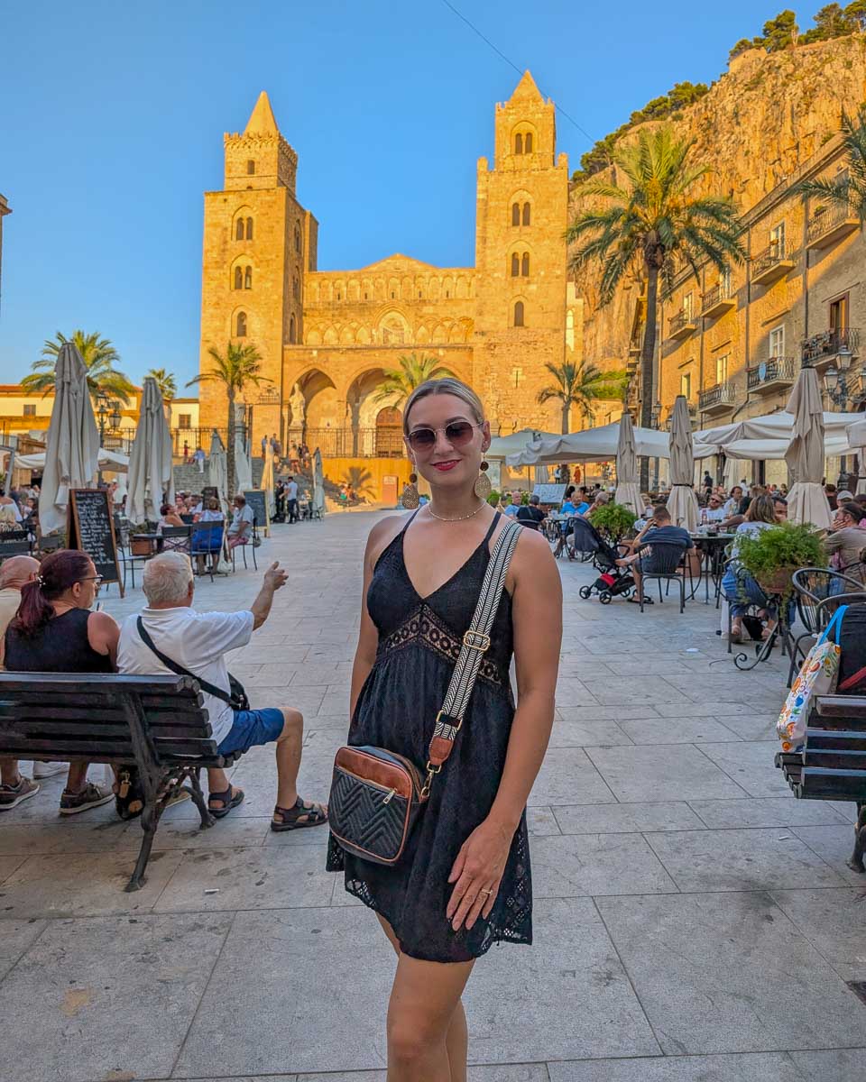 Bailey-stands-in-Piazza-Duomo-Cefalu-Italy on a trip from Palermo Sicily