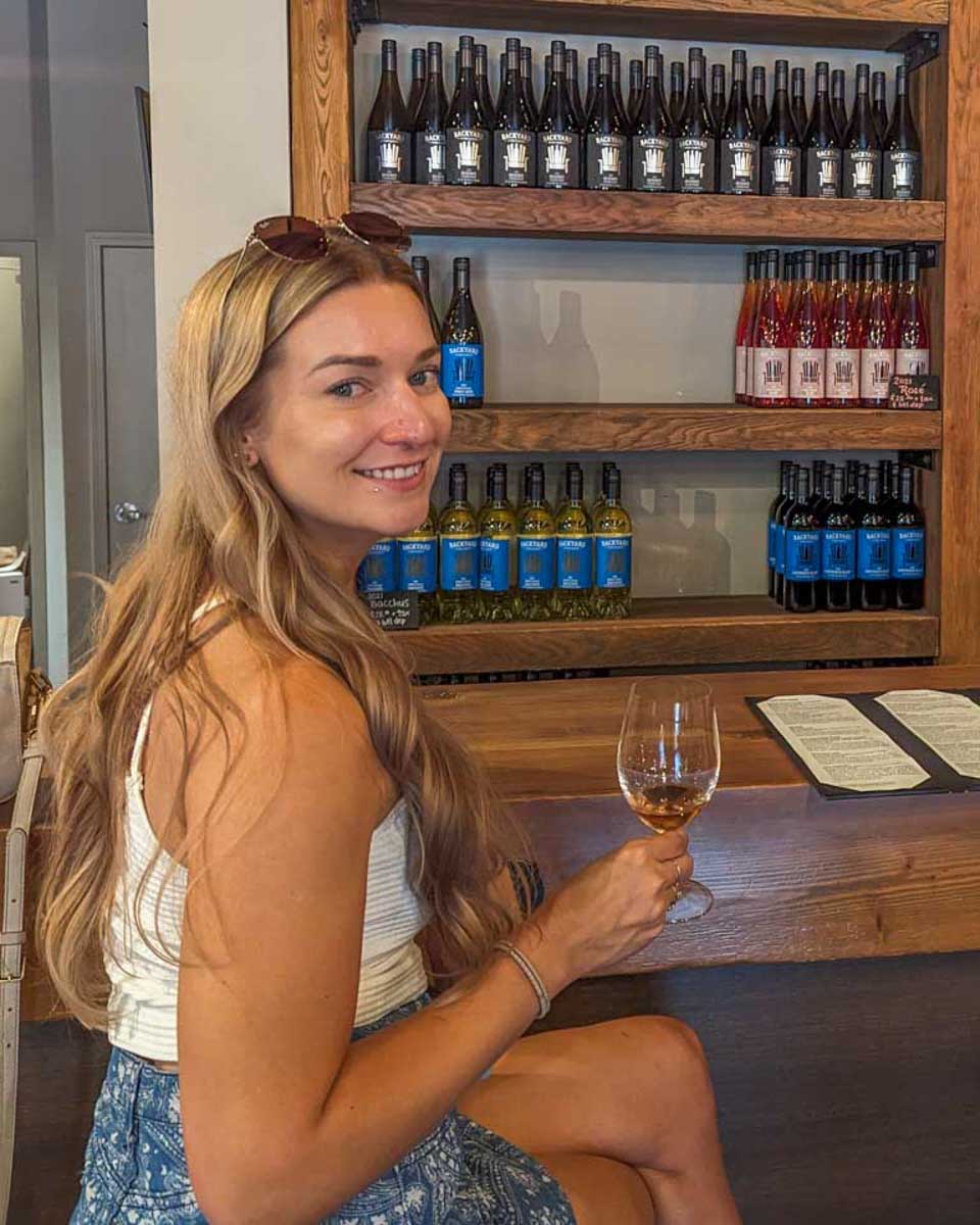 Bailey-tastes-wine-in-the Utiel-Requena wine region on a tour from Valencia Spain