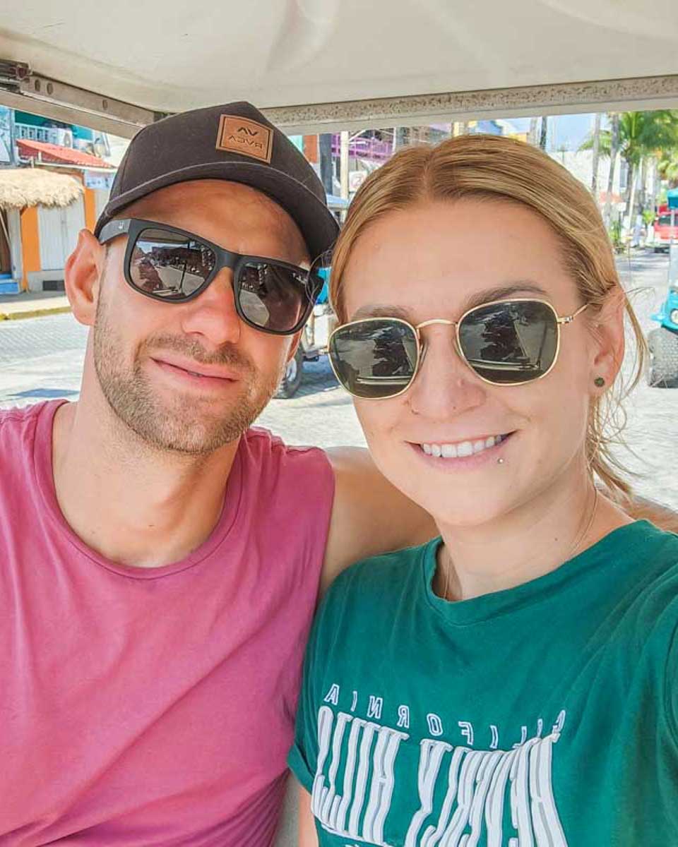 Daniel-and-Bailey-take-a-selfie-in-a-golf-cart-in Turks and Caicos