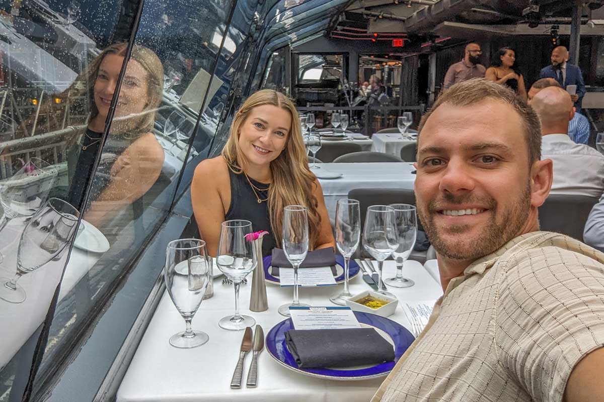 Daniel-and-Bailey-take-a-selfie-on-a-river-cruise-Paris-France
