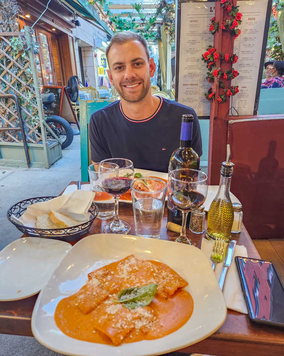 Daniel-enjoys-a-pasta-dish-on a food tour in Bologna Italy