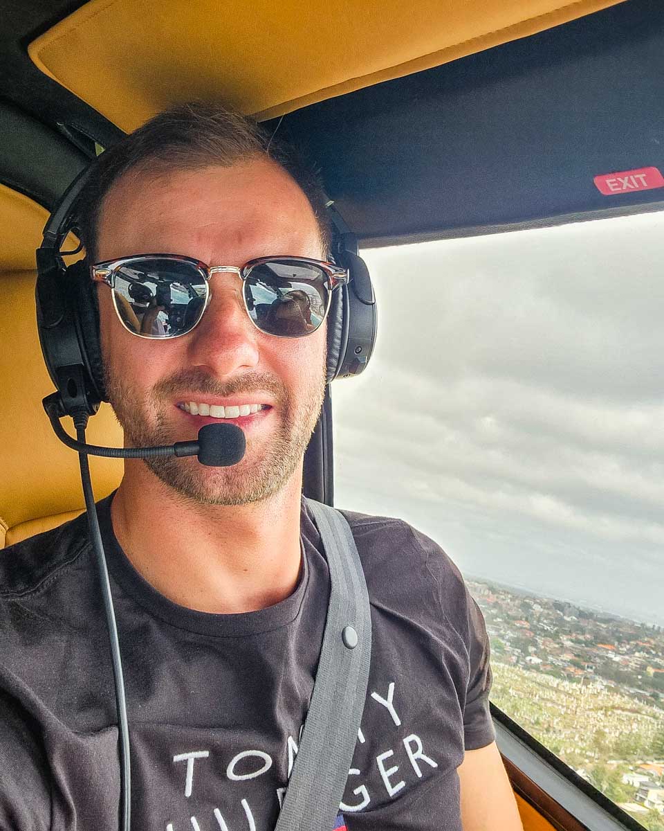 Daniel-takes-a-selfie-while-flying in a helicopter over Kauai Hawaii