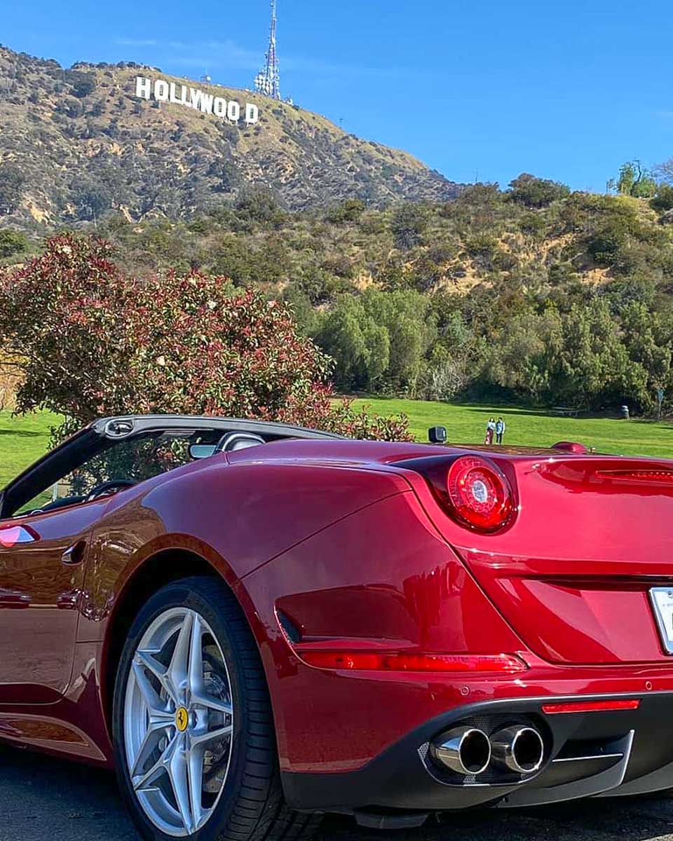 I Ride Like A Star cars parked at the Hollywood sign in Los Angeles