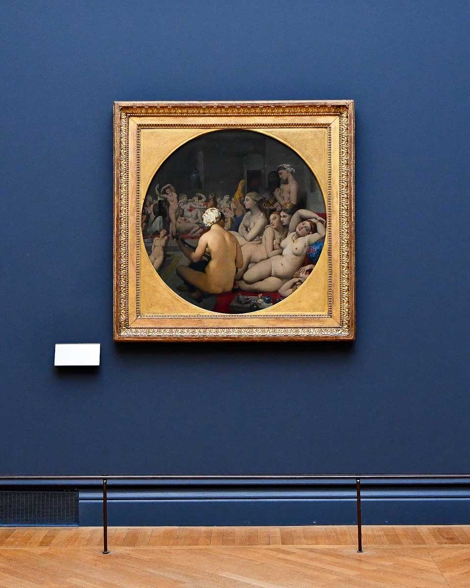 Musée du Louvre painting on a blue wall in Louvre Paris France