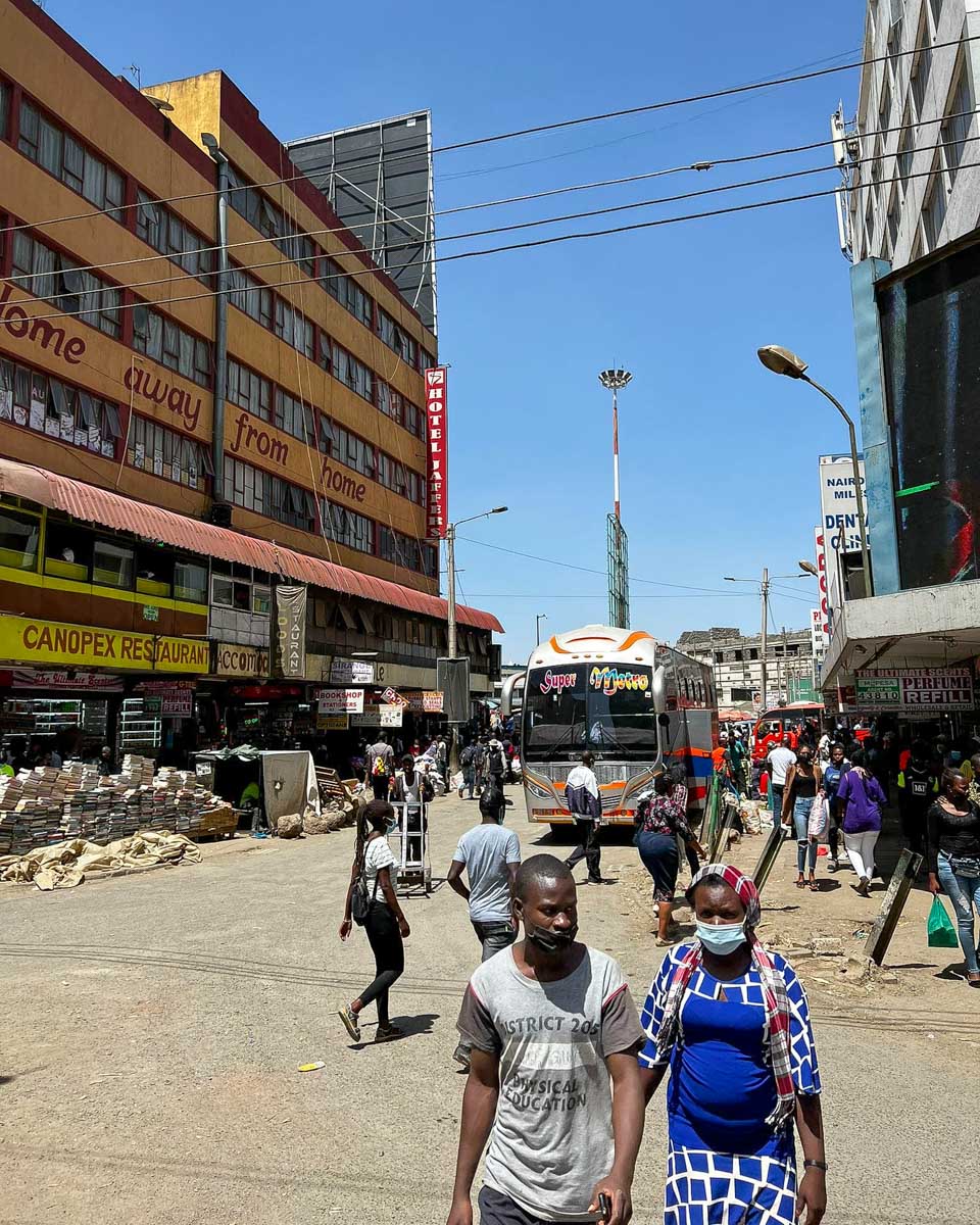 Nai Nami people walking through the street on a tour on Nairobi Kenya