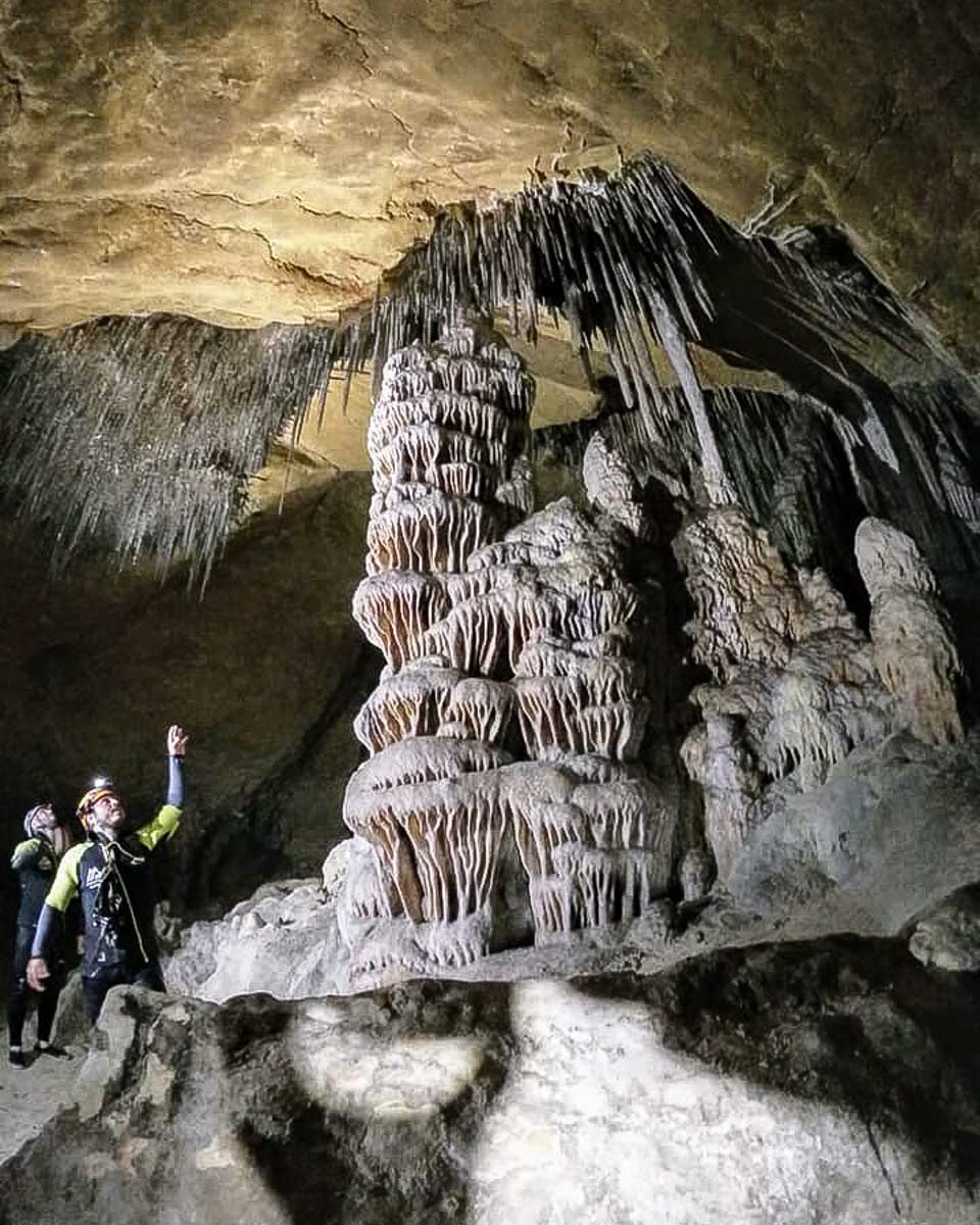 People exploring caves on a tour from Palma de Mallorca Spain