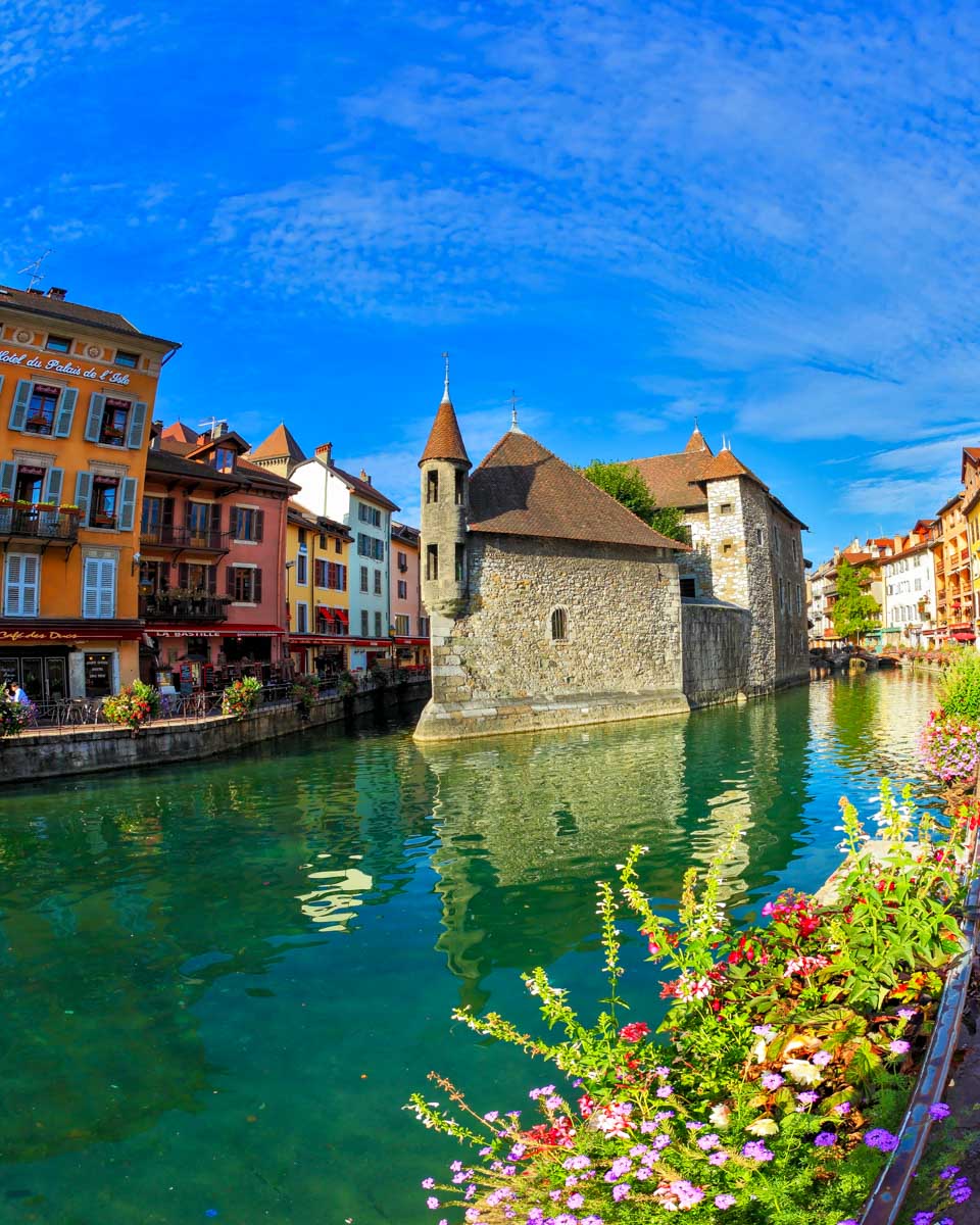 The Palais de l’Isle in the town of annecy seen on a tour from Geneva Switzerland