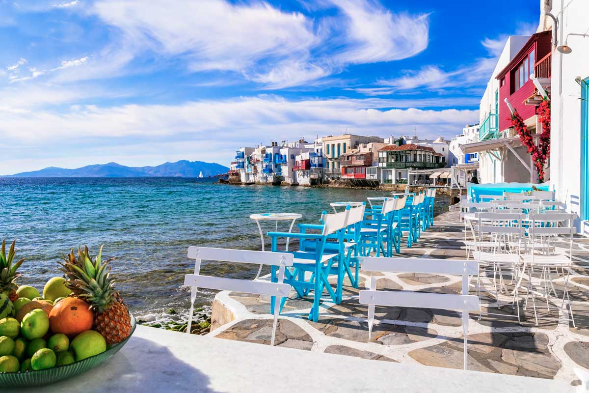 The coastline and many colorful buildings in Mykonos Greece