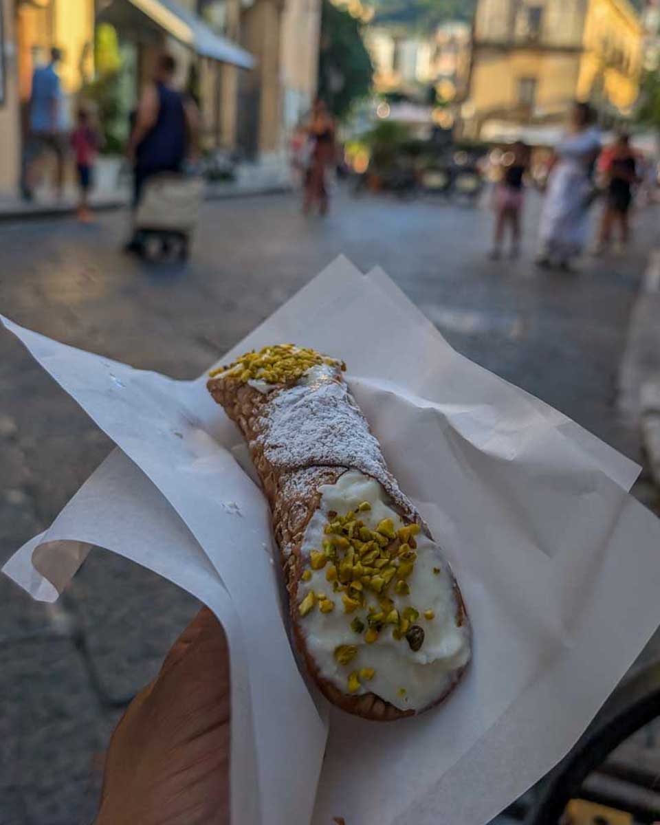 A cannoli eaten on a food tour in Milan Italy