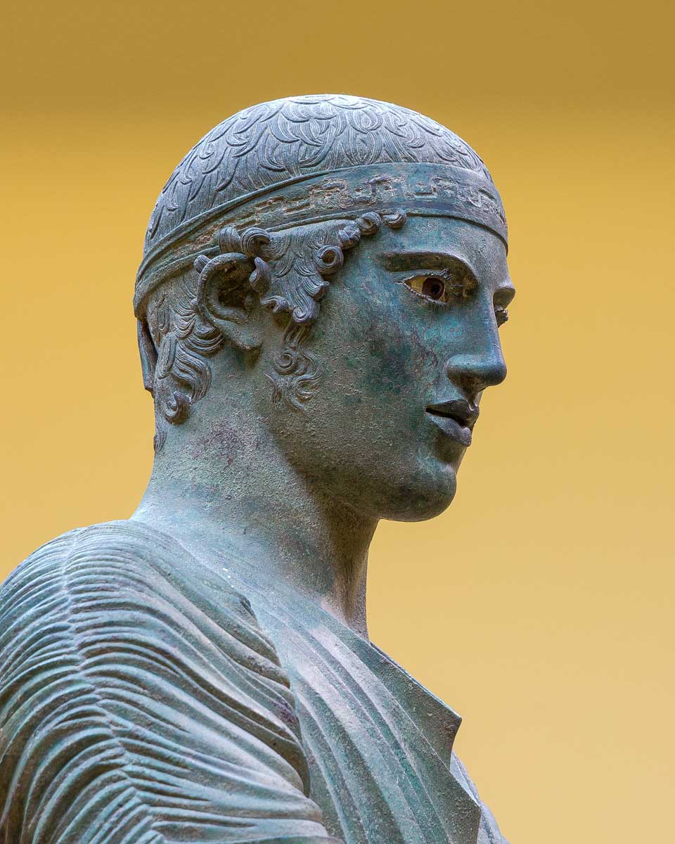 A charioteer of Delphi in the Delphi Archaeological Museum on a tour from Athens