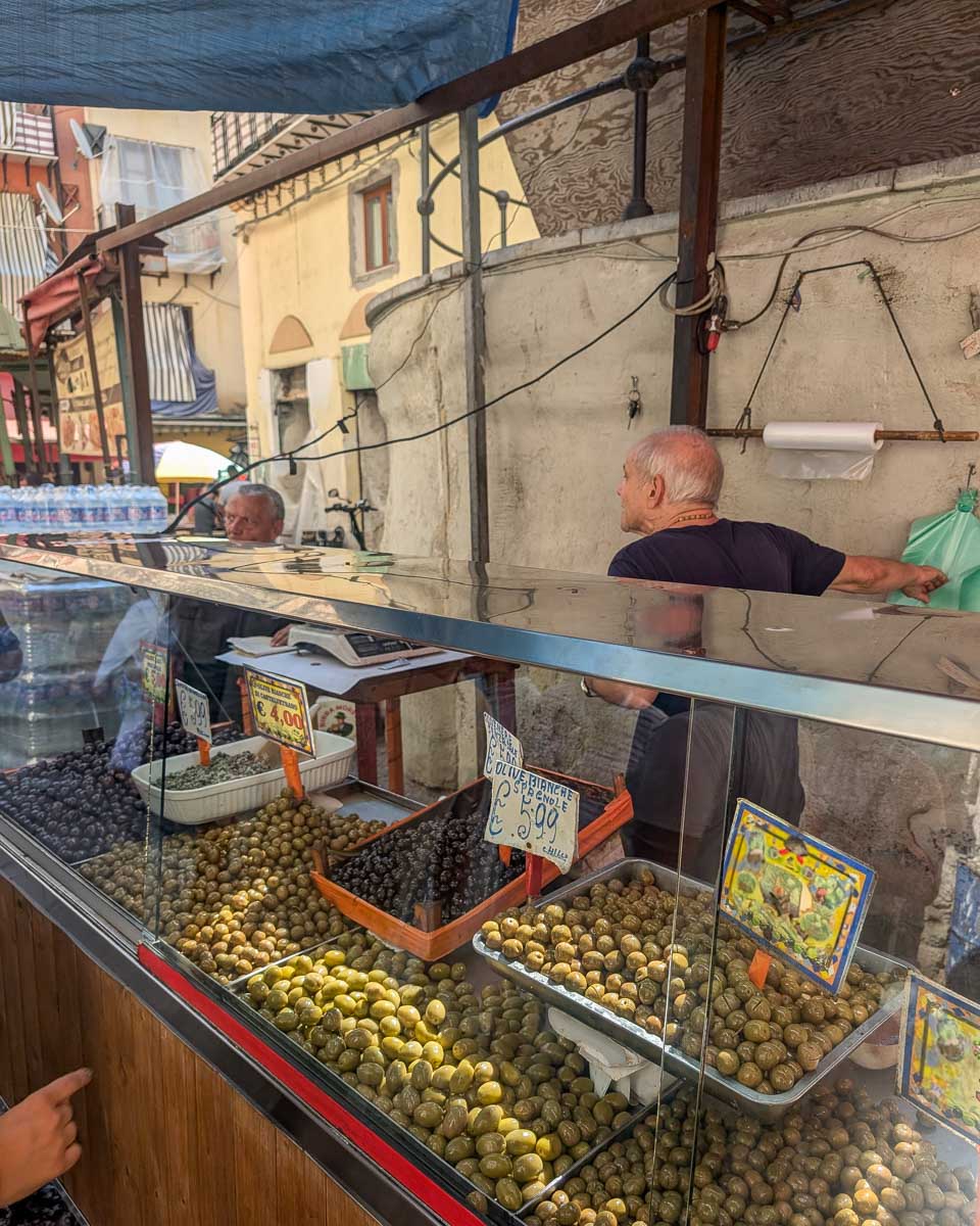 An-olive-stand-seen-on-a-food-tour-in-Corfu greece