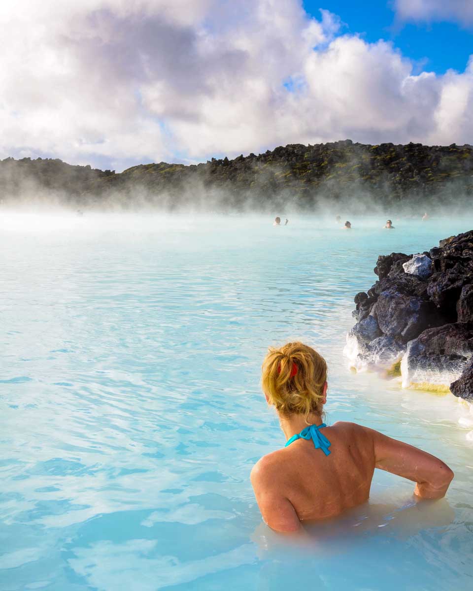 Bailey sits in the Blue Lagoon on a tour from Reykjavik Iceland